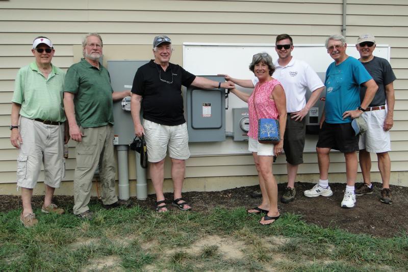 Shown are (l-r) Allan Cairncross, UUSD member; Gary Schmidt, UUSD member; John Sykes, member UUSD and Delmarva Power and Light; Lisa Locke, Delmarva Power and Light executive director; Andrew Abel, Clean Energy USA; Al Lister, UUSD member; and Ron Schaeffer, UUSD member. SUBMITTED PHOTO
